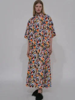 ZIP-UP OVERSIZED POLO TOP - ABSTRACT
